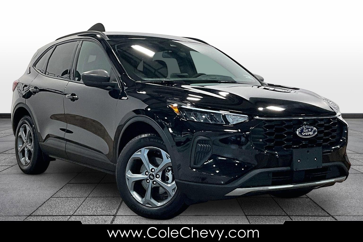 2025 Ford Escape ST-Line in Black — front three-quarter view