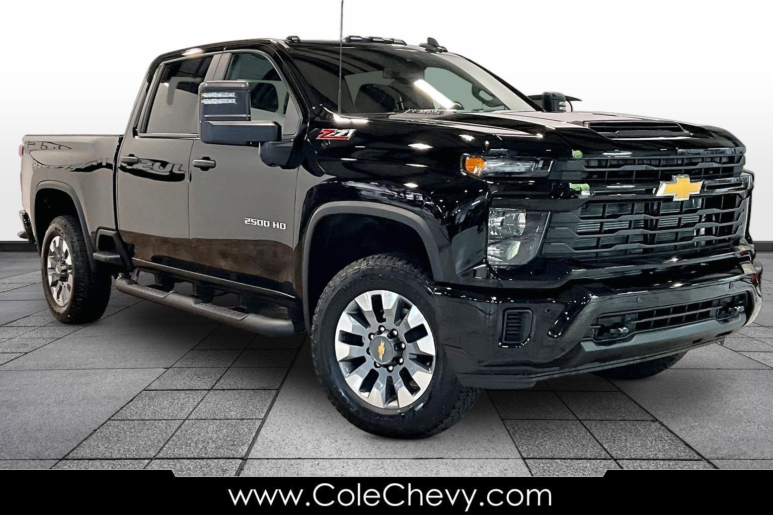 2026 Chevrolet Silverado 2500 HD Custom in Black — front three-quarter view