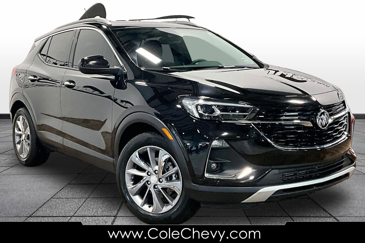 2023 Buick Encore GX Essence in Ebony Twilight Metallic — front three-quarter view